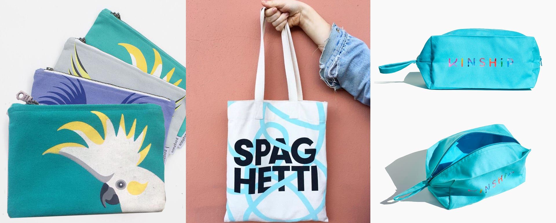 A natural-canvas apron produced by Work+Shelter, displayed on a wooden coat hanger